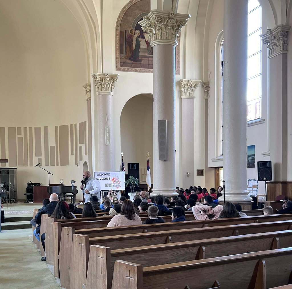 People sitting in a church. 