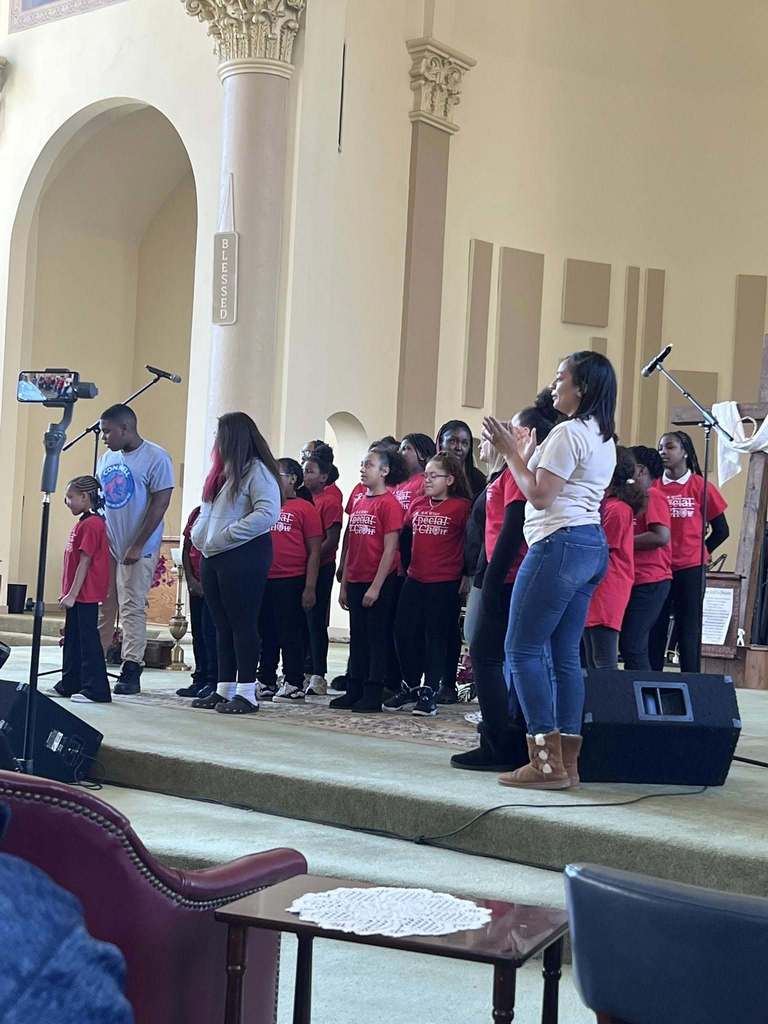 People singing in a church. 