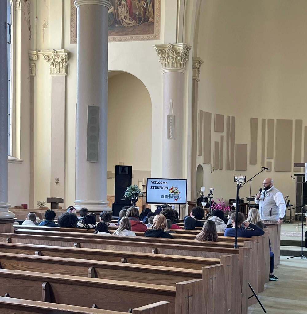 People sitting in a church. 