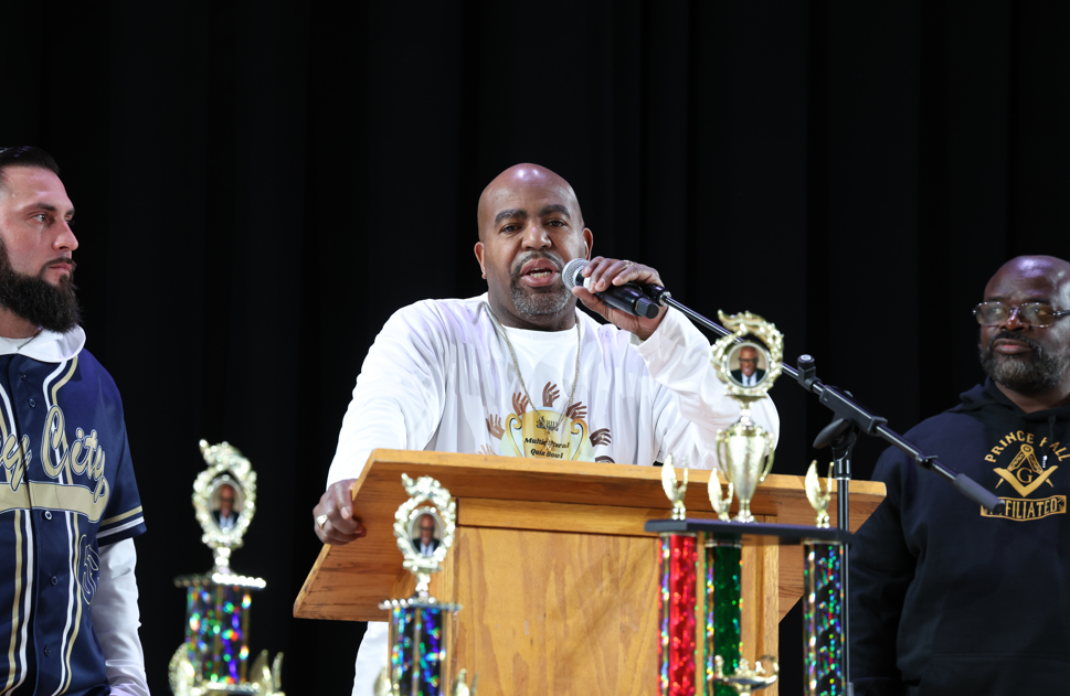 A man speaking at a podium.