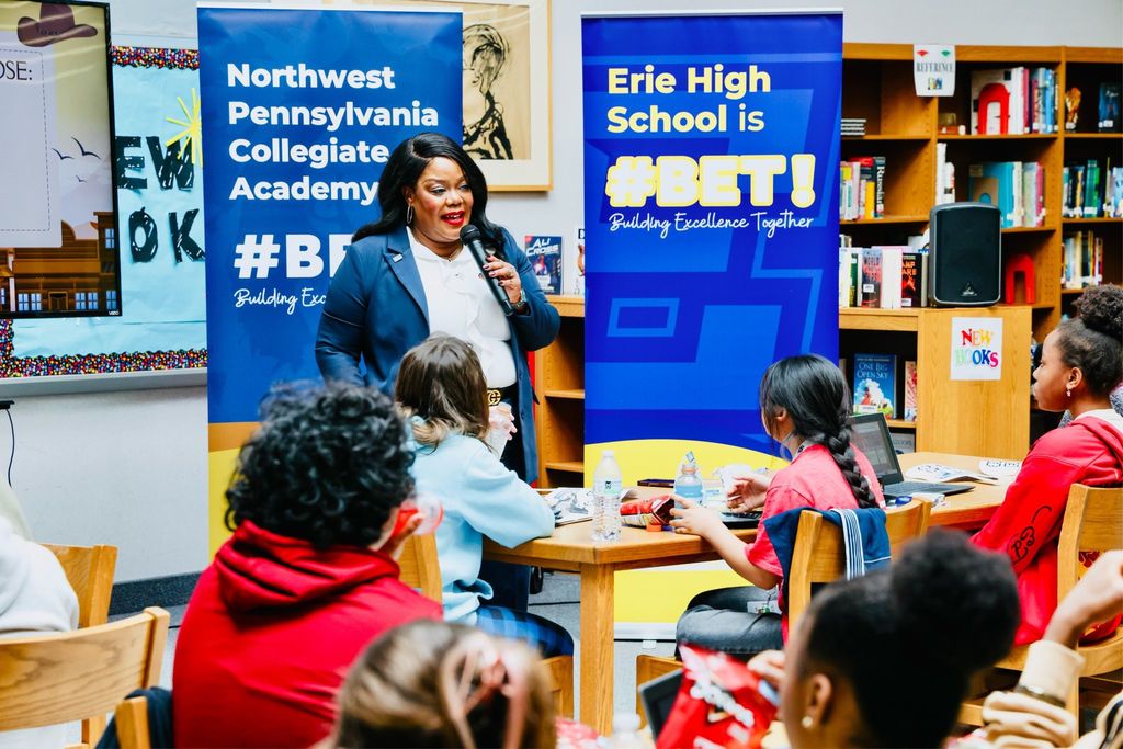 Dr. Natalyn Gibbs speaking in front of students. 
