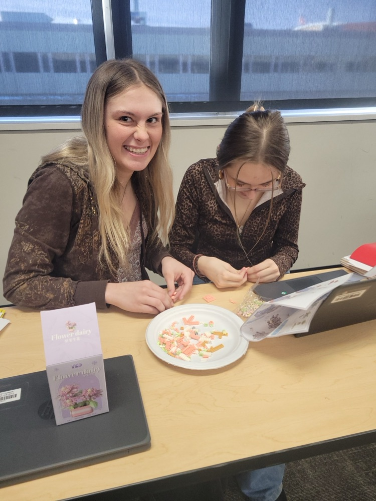 students working on Legos