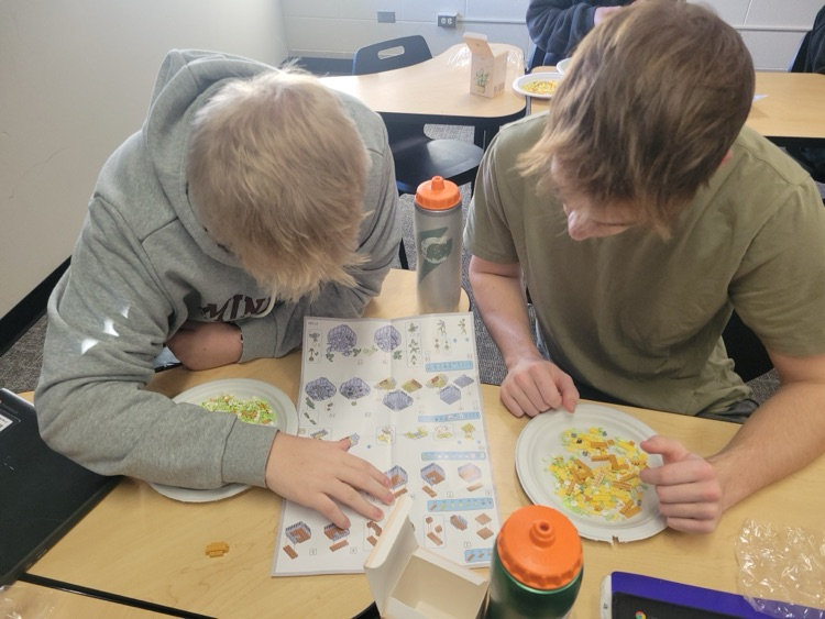 students working on Legos