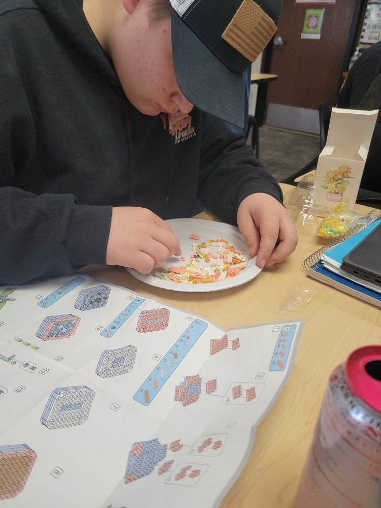 students working on Legos