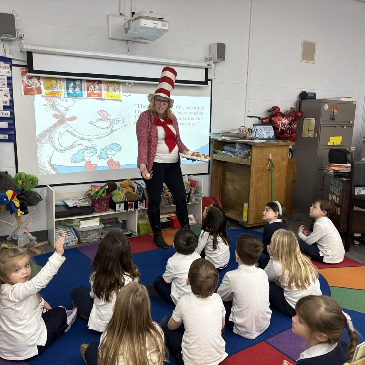 Students learning about different colored eggs.