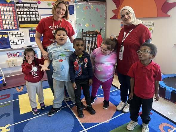 Students and teachers wearing something red. 