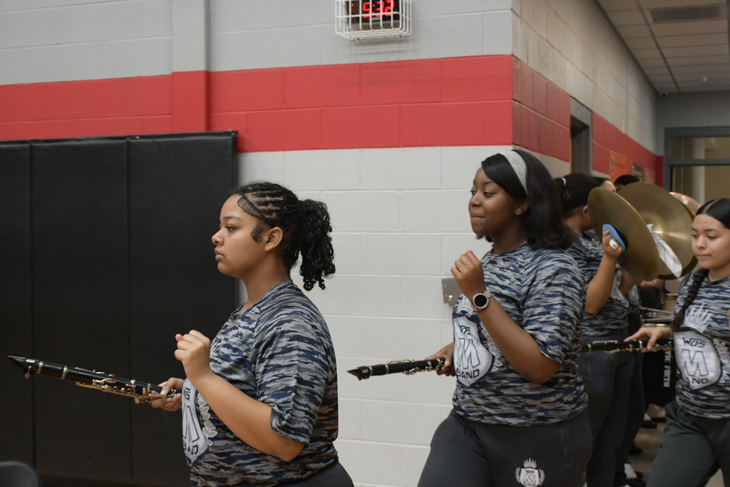 M3 Band members walking out to the court