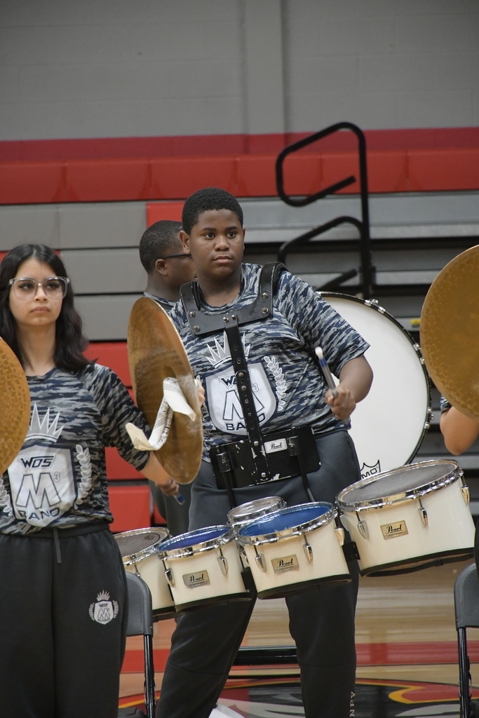 M3 Band drumline playing in the gym