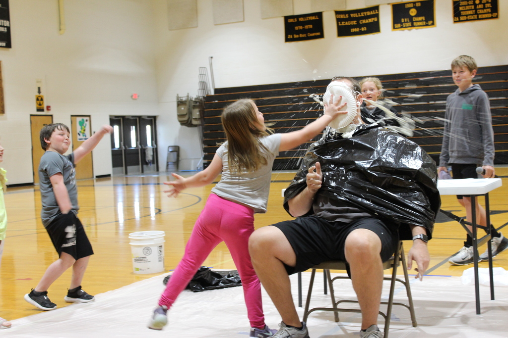 Mr. Magee pie in the face