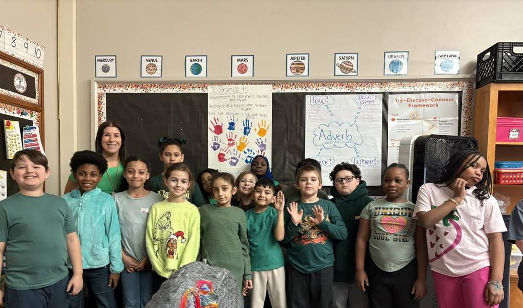 Teacher and students wearing green.