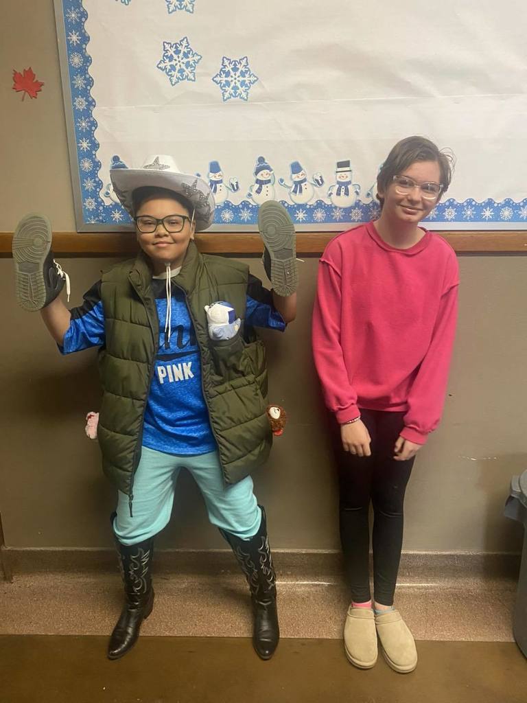 Students wearing their clothes backwords, inside out, and mismatched for Read across America week.