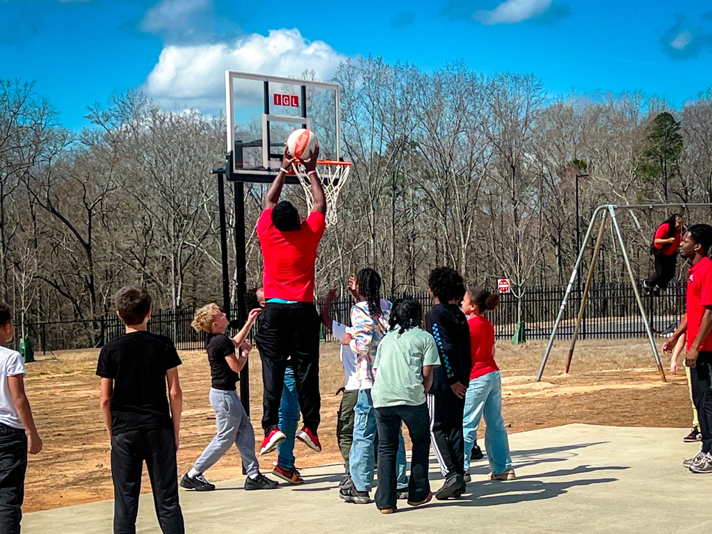 PCHS Service Leadership reading with PCES Trailblazers