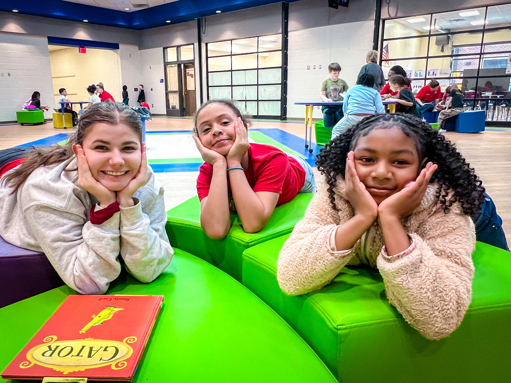 PCHS Service Leadership reading with PCES Trailblazers