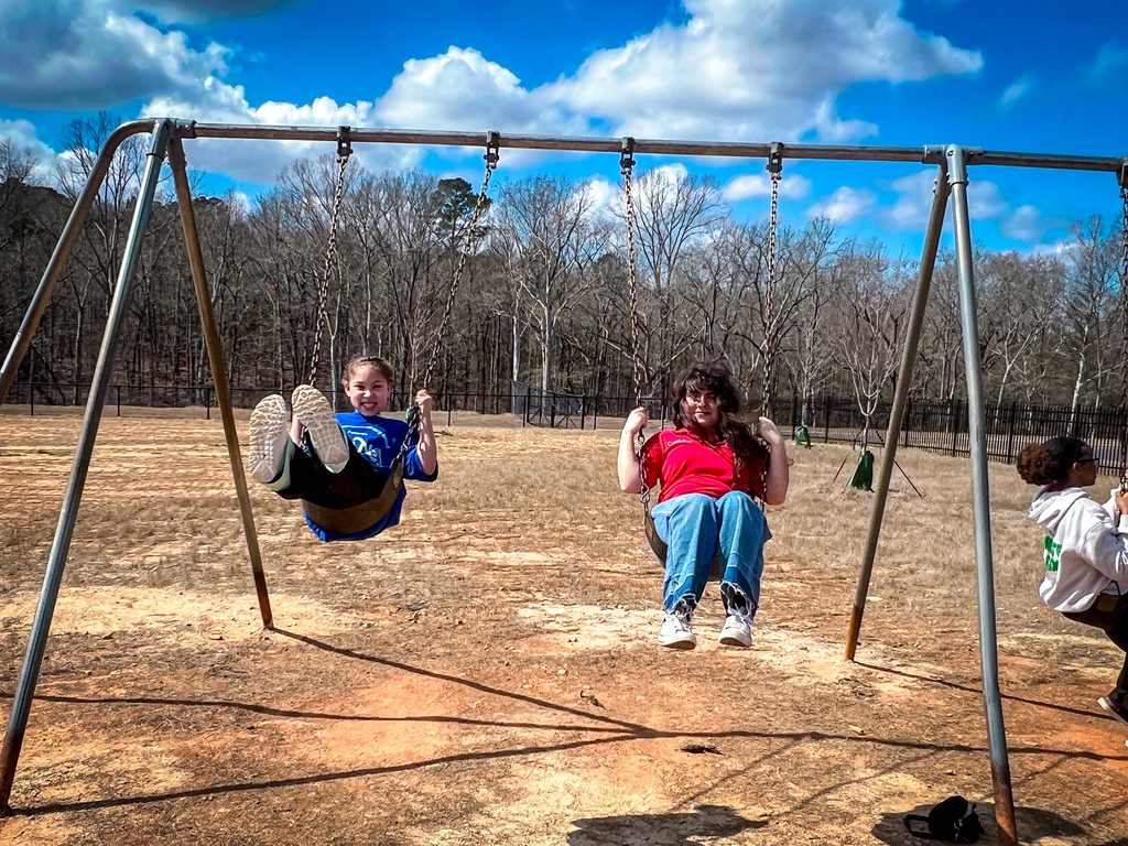 PCHS Service Leadership reading with PCES Trailblazers