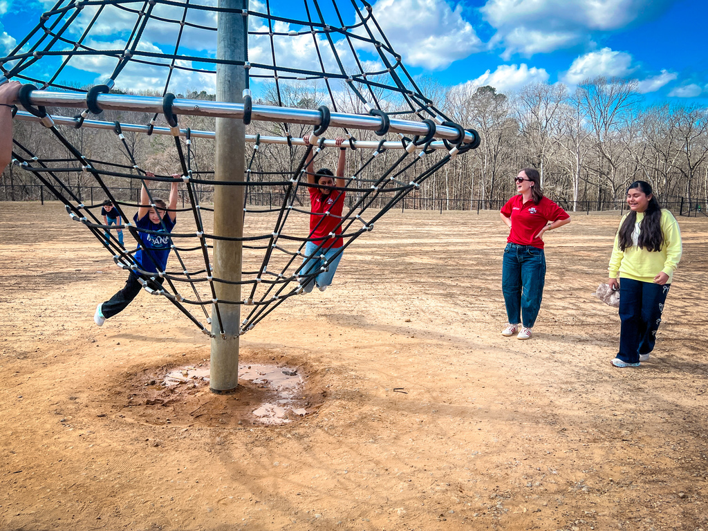 PCHS Service Leadership reading with PCES Trailblazers