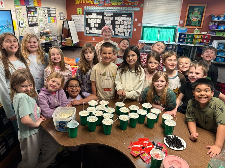students in PJs with Frobscottle drinks