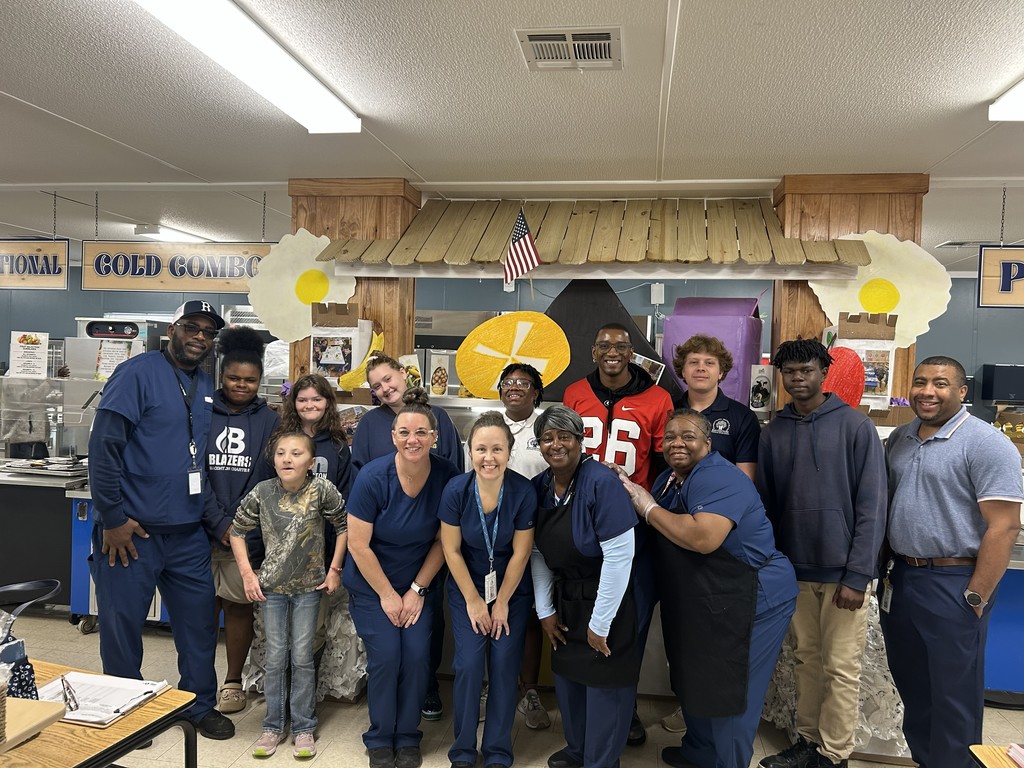 Lunchroom staff with Malcom Mitchell