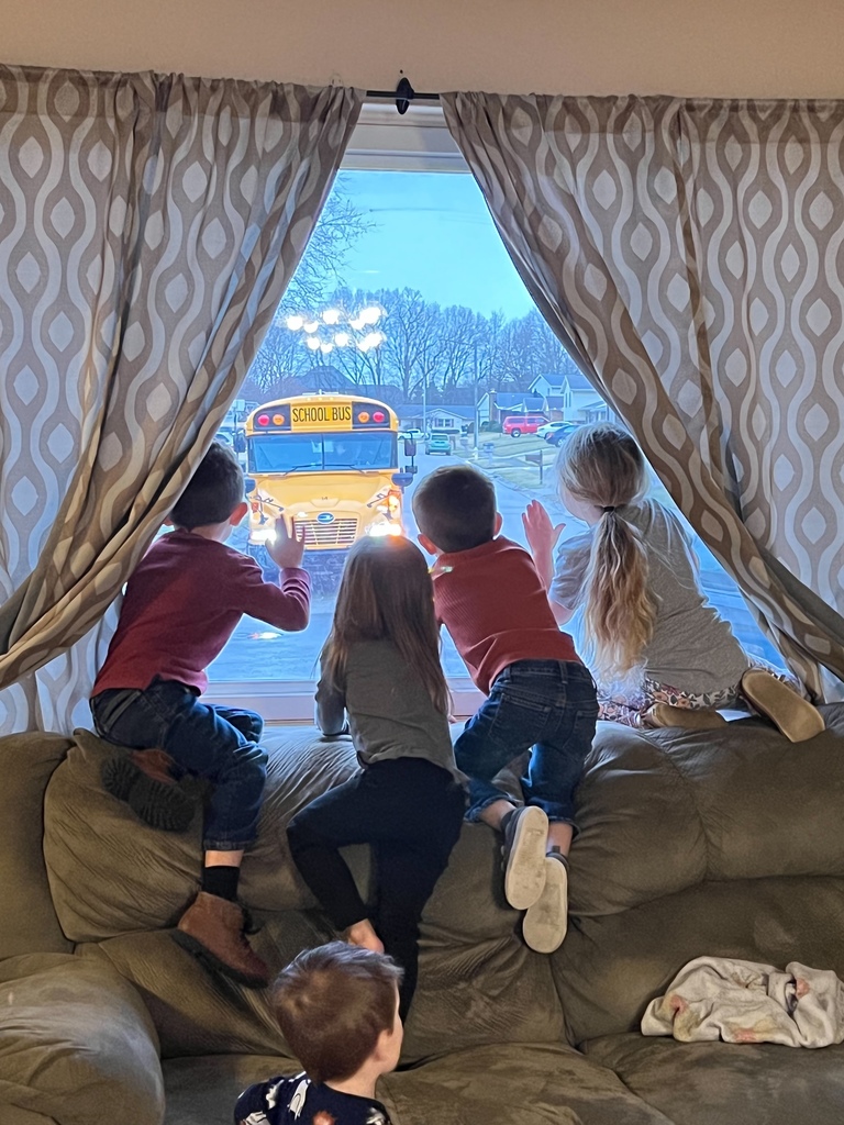 The little ones waving to Mr. Tom, driver of bus 14.