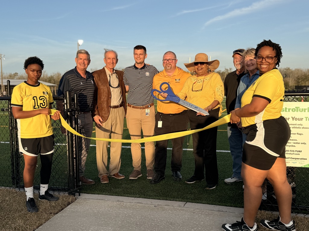 Vera Shamplain ribbon cutting