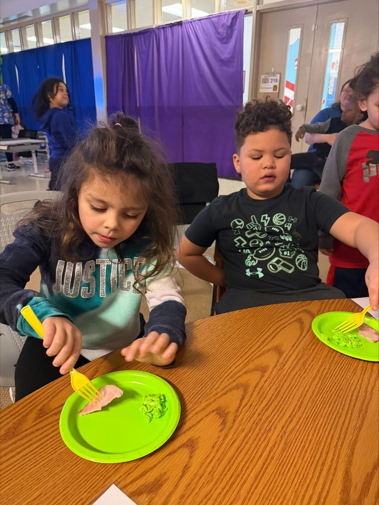 Students eating green eggs and ham. 