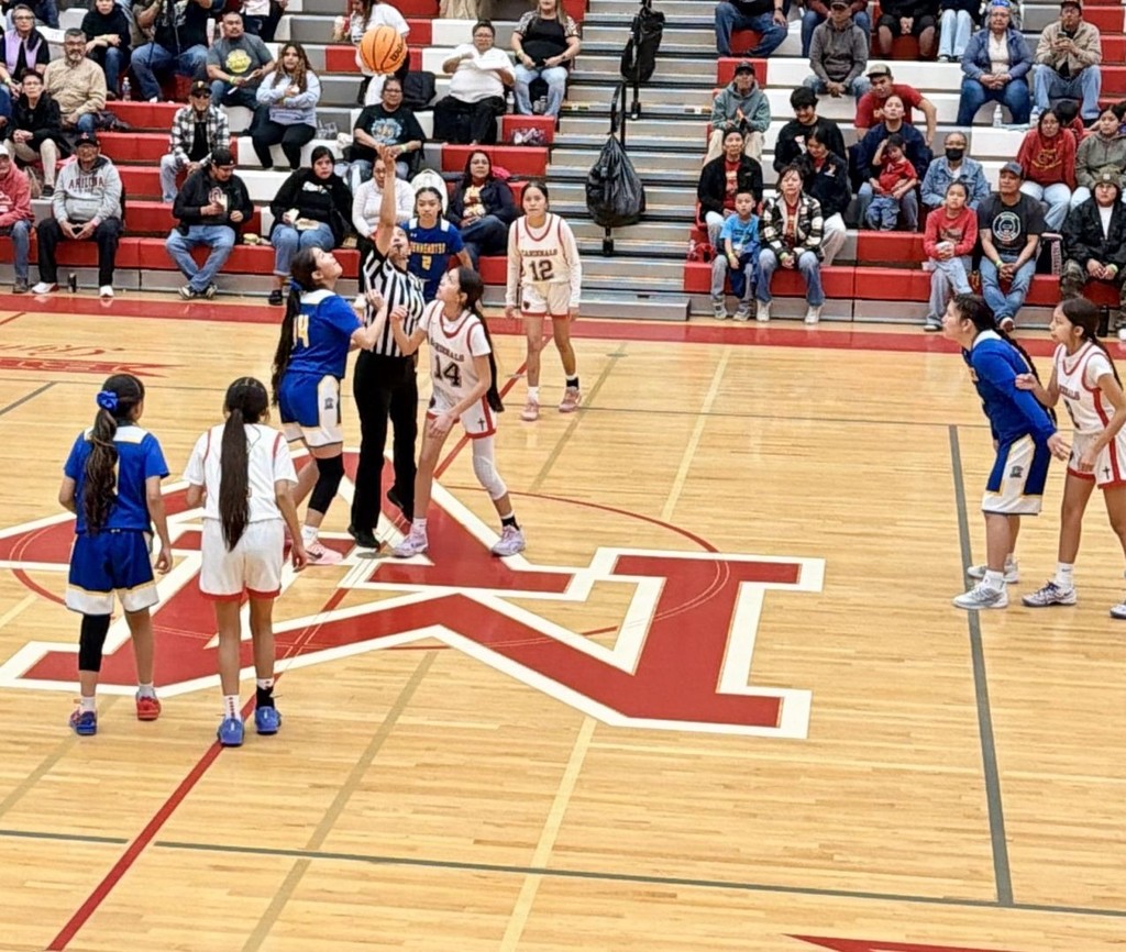 Girls starting basketball game 