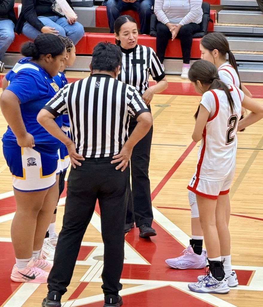 Girls talking to referee