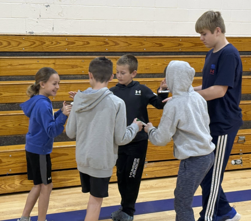 All Together Now! 💙💛💚❤️ Today our Houses kicked off with an assembly full of teamwork, laughter, and just a little bit of strategy! Students competed in a race across the gym, but there was a catch! Each team had to get every member from one end to the other while staying connected using only one finger and a marker. No breaking the chain! It was the perfect way to launch our March Character Strong focus: Collaboration. Students quickly learned that success wasn’t about speed alone — it was about communication, patience, encouragement, and working together toward a common goal. These schoolwide assemblies are powerful for our students and our staff. While students build relationships and school spirit, our teachers gain valuable time to collaborate and dive into data to better support every learner. We are stronger when we work together. 💪 #AllTogetherNow #CharacterStrong #Collaboration #HousePride