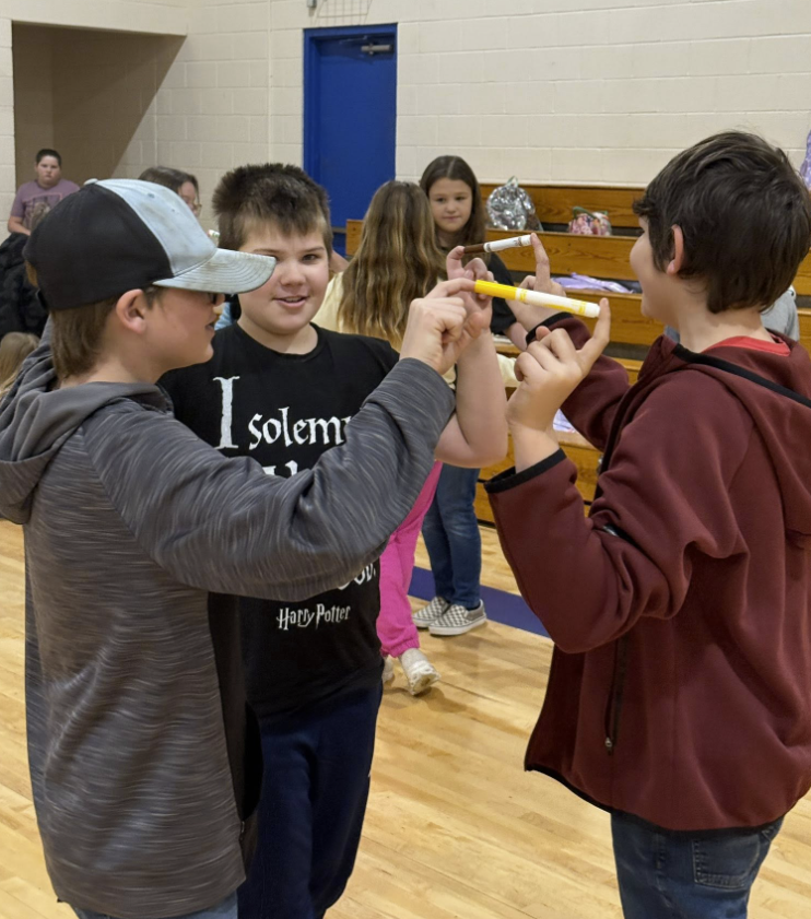 All Together Now! 💙💛💚❤️ Today our Houses kicked off with an assembly full of teamwork, laughter, and just a little bit of strategy! Students competed in a race across the gym, but there was a catch! Each team had to get every member from one end to the other while staying connected using only one finger and a marker. No breaking the chain! It was the perfect way to launch our March Character Strong focus: Collaboration. Students quickly learned that success wasn’t about speed alone — it was about communication, patience, encouragement, and working together toward a common goal. These schoolwide assemblies are powerful for our students and our staff. While students build relationships and school spirit, our teachers gain valuable time to collaborate and dive into data to better support every learner. We are stronger when we work together. 💪 #AllTogetherNow #CharacterStrong #Collaboration #HousePride