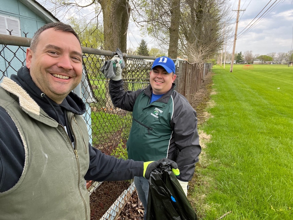 Volunteers pose to smile.