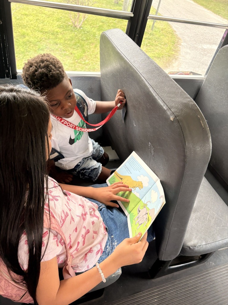 CES Student Reading to Past Teacher
