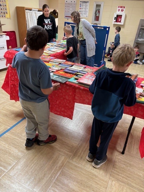 students selecting books