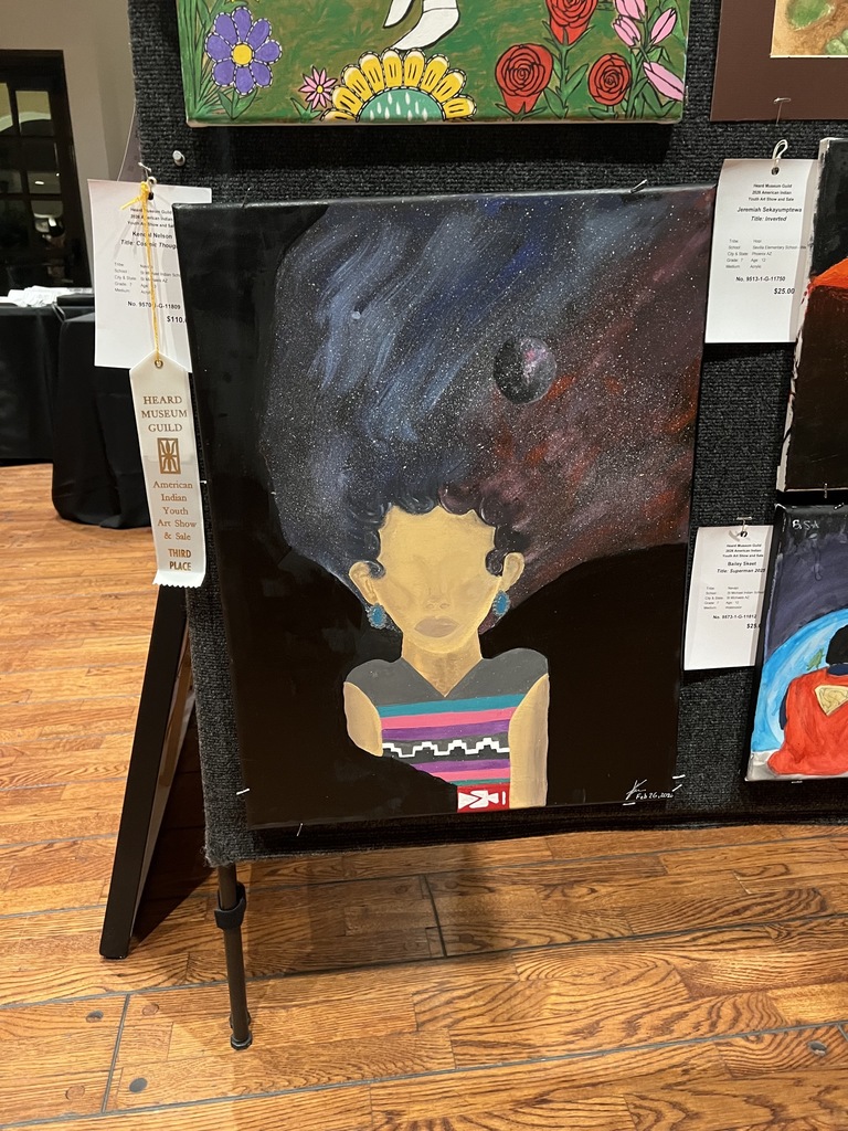 painting of a women whos hair is a galaxy