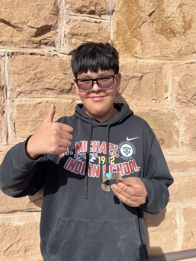 student who made a bracelet for art show