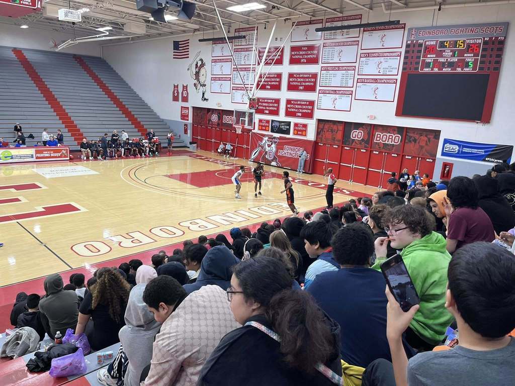 People watching a basketball game.
