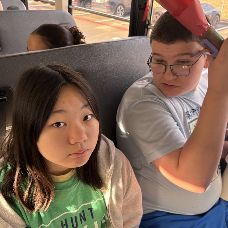 students on bus to special Olympics