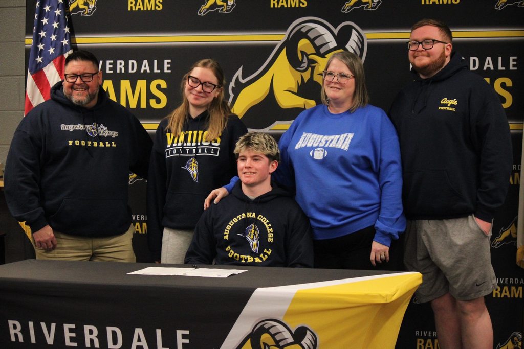 Students signing for college athletics