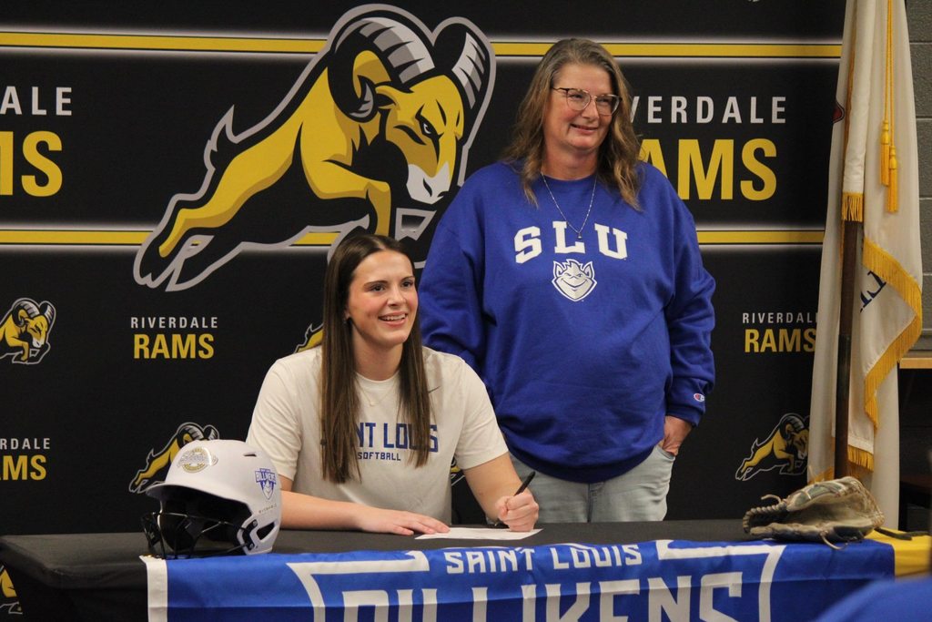 Students signing for college athletics