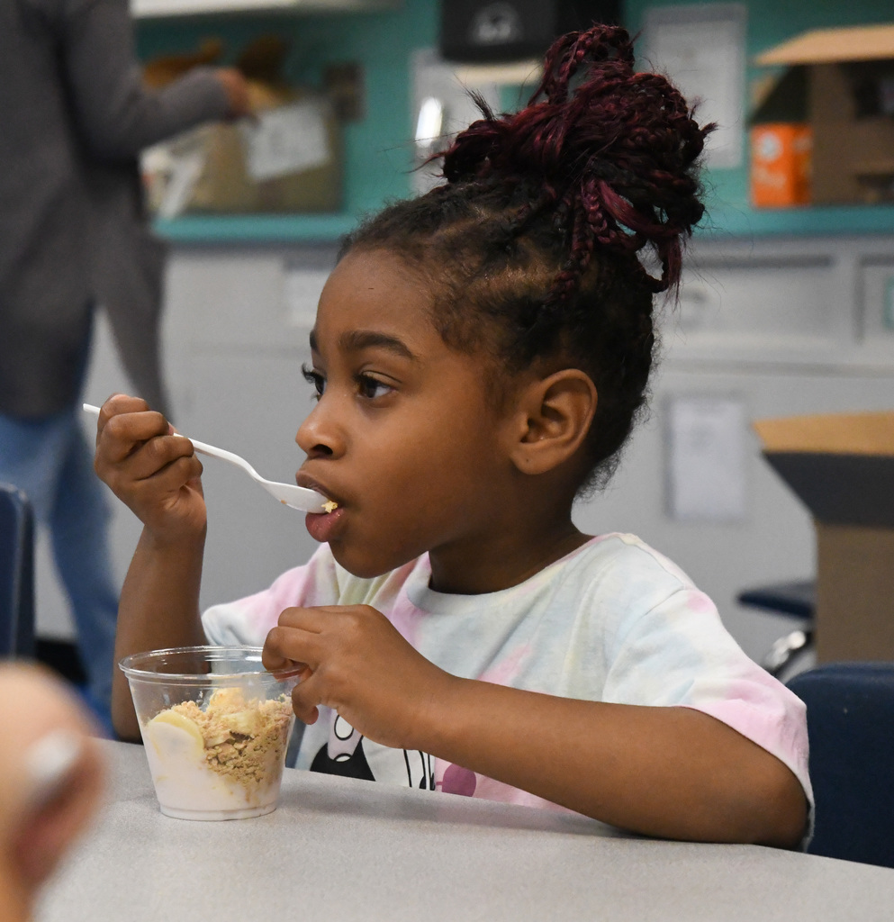 girl eating a parfait