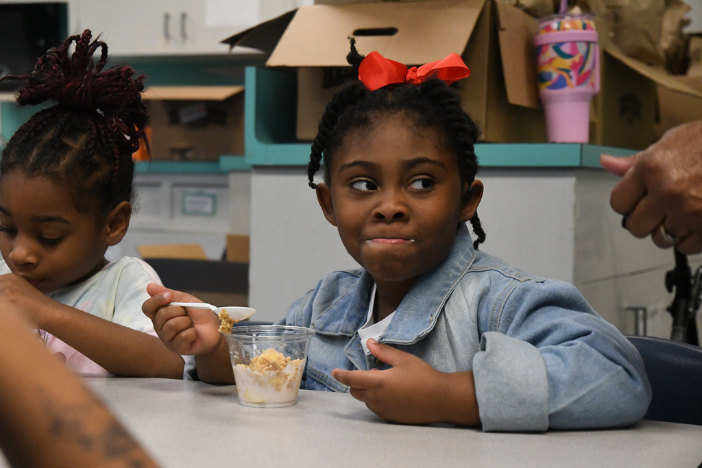 girl eating a parfait