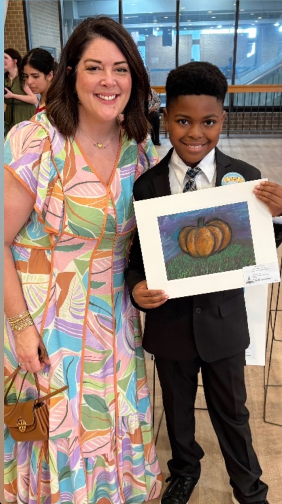 Mrs. McGregor and Noah Thomas as the State Capital Art Show