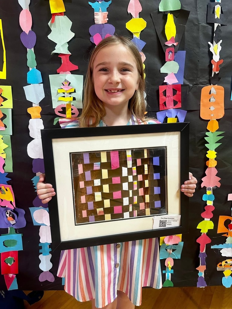 Proud artist showing off her work