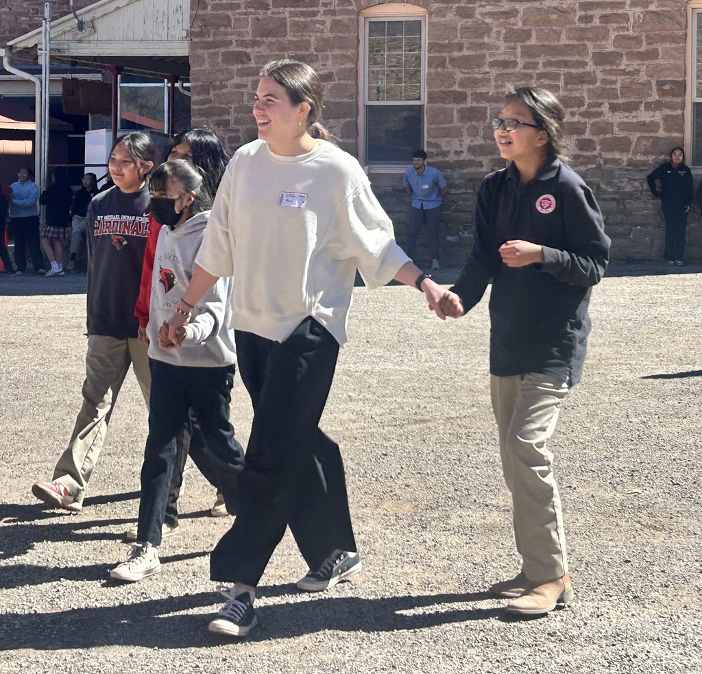 Students playing a game with Franciscan University Students