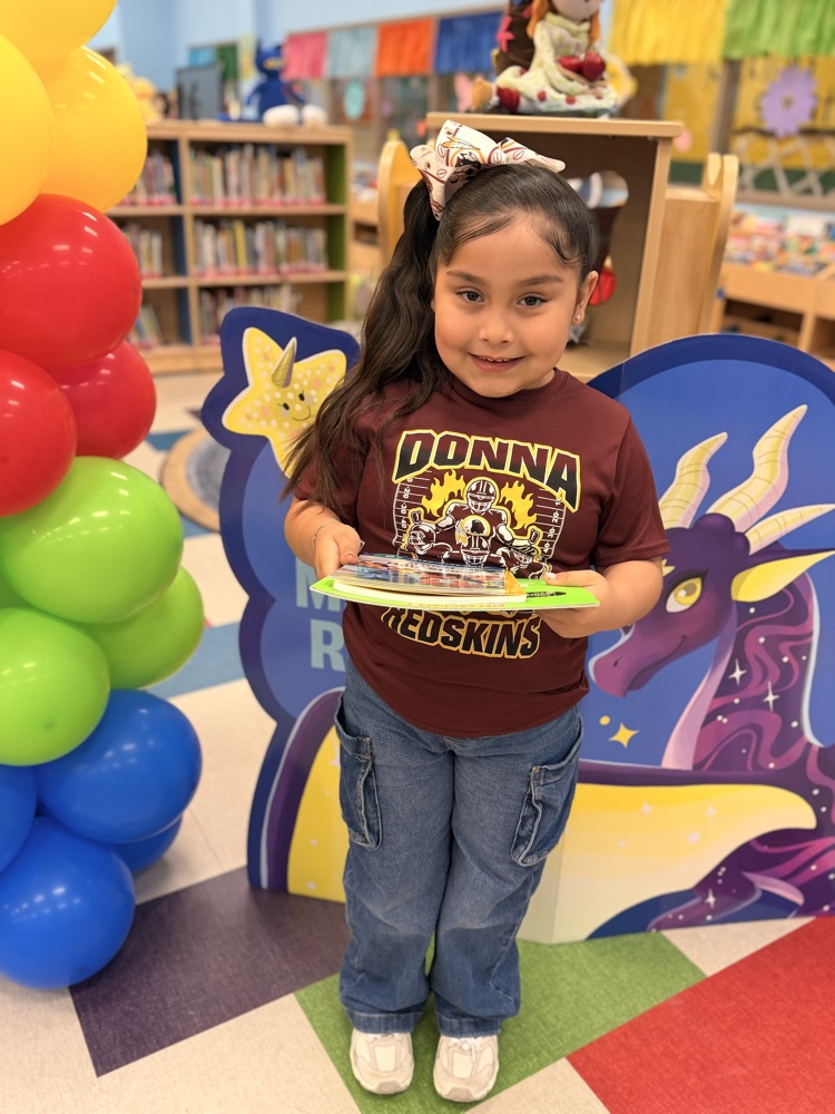 student winner with balloons 