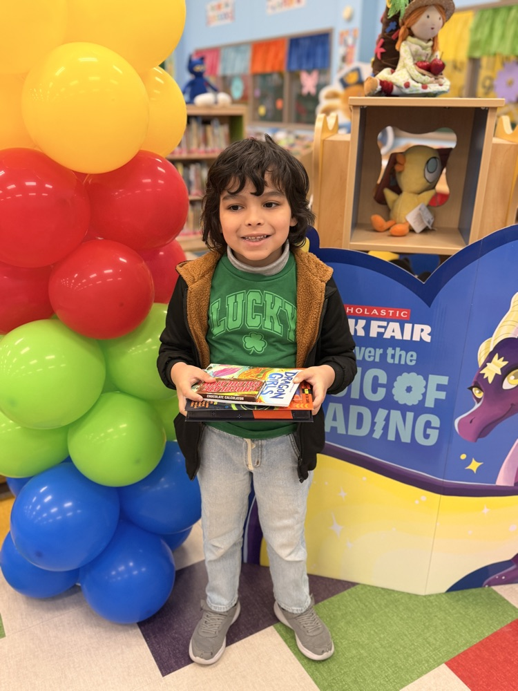student winner with balloons 