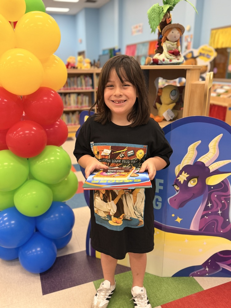 student winner with balloons 