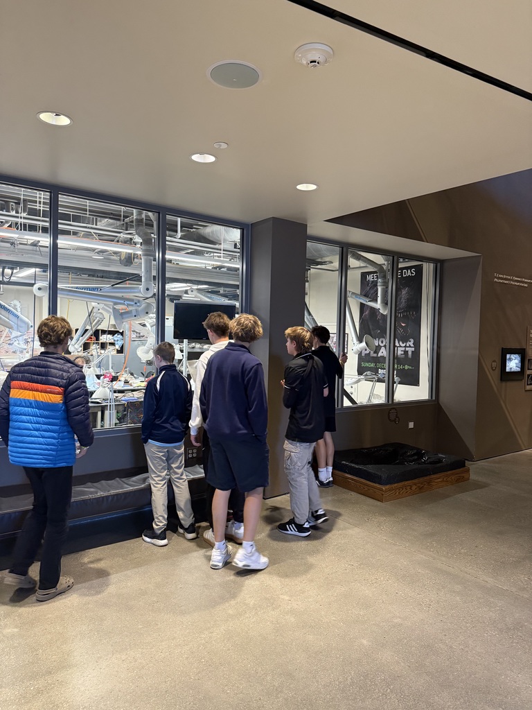 Researchers viewed by students in a lab