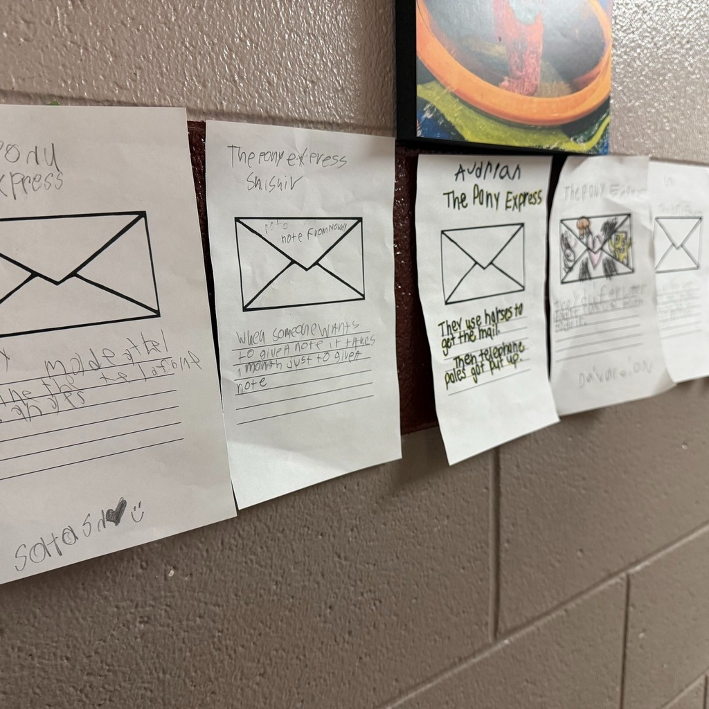 Paper envelops colored with writing under them.