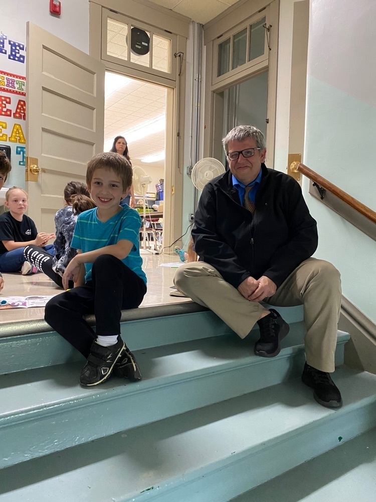 superintendent with student