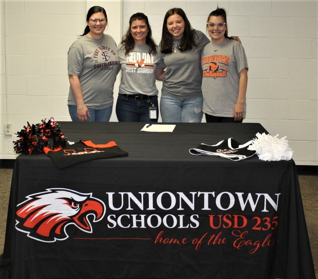 Picture of senior student Camryn Davis and the Uniontown High School Cheer coaches and Head Cheer Coach at Fort Scott Community College.