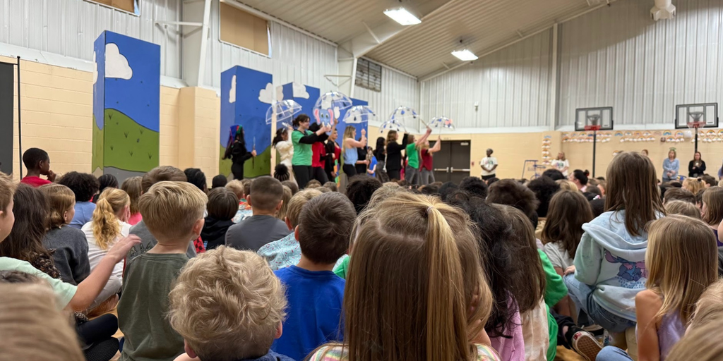 Park students watching the play Oliviatown performed by the high school
